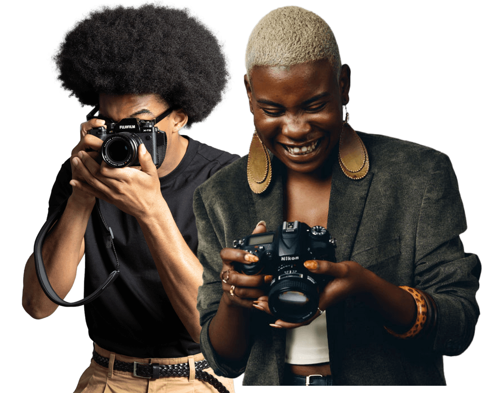 Two photographers; on the left, a photographer is looking through the viewfinder, and on the right, the photographer is smiling and looking at the camera in their hands.